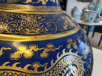 A large Chinese monochrome blue gilt-decorated 'dragon and phoenix' bottle vase, Guangxu mark and of the period